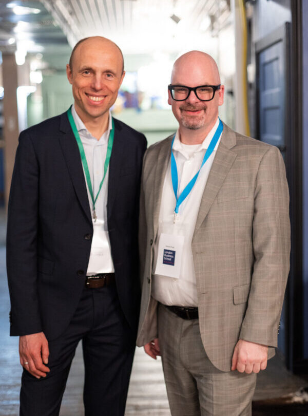 "Instructors Sergey Kouk and Devin Pratt from LBS and Columbia EMBA programs, smiling for the camera